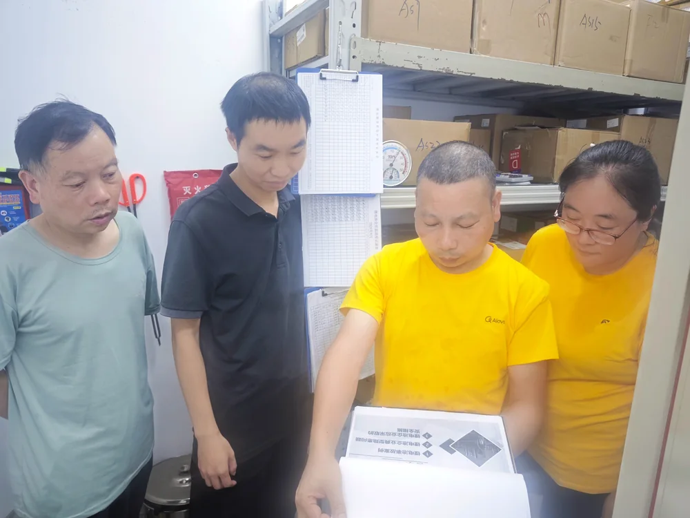Alova employees reviewing on-site documents