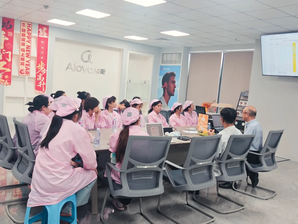 Alova production team attending an internal learning session
