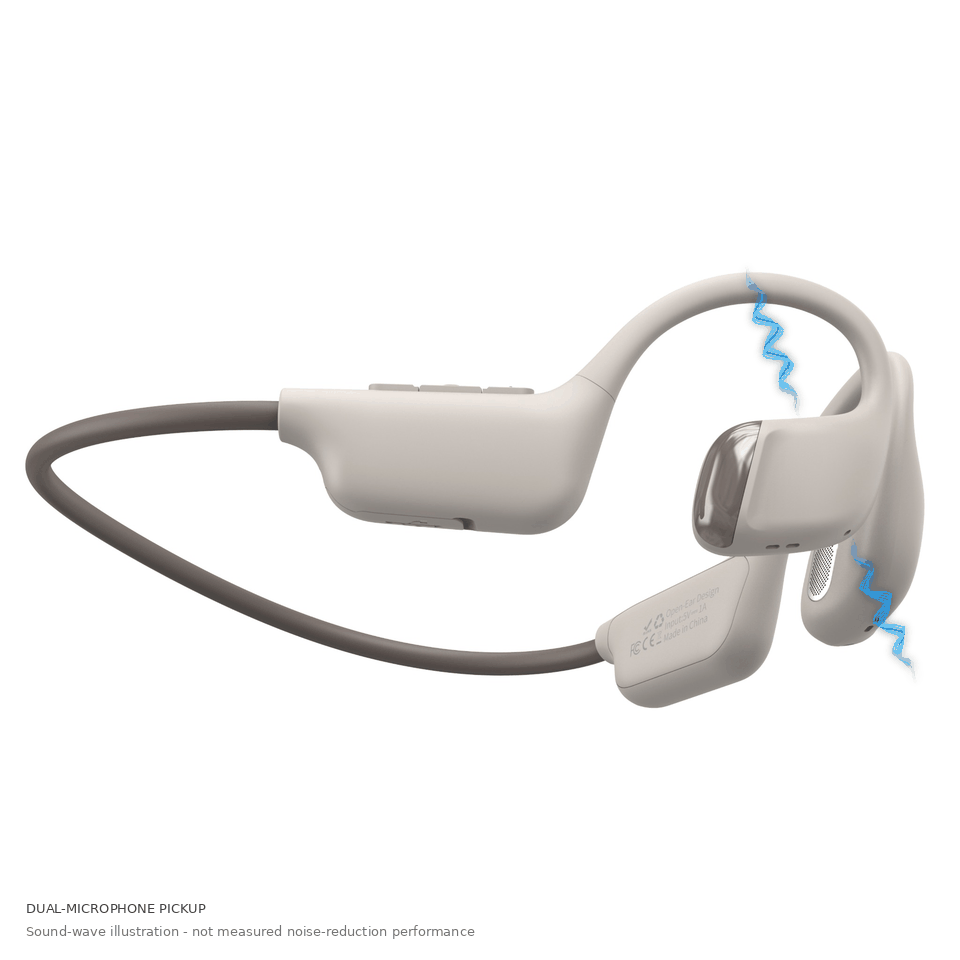 Blue line waveforms illustrate sound pickup at two microphone positions; not measured noise-reduction data.